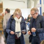 People looking at guide
