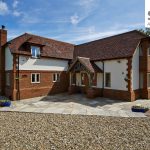 Timber Frame Dream Home – Frame Technologies with logo